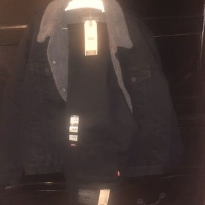 Mens black Levi’s trucker jacket with 511 slim fit Levi’s jeans